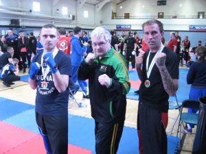 Two fighters with Brendan Donnelly 8th Dan Karate and kick boxing instructor