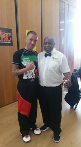 Sensei Donnlly's Stydent Ian Warren picture with Ronnie Green 6 times World Muay Thai Champion