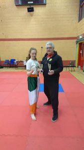 Brendan Donnely with student Mollie Carolan at the East Coast open